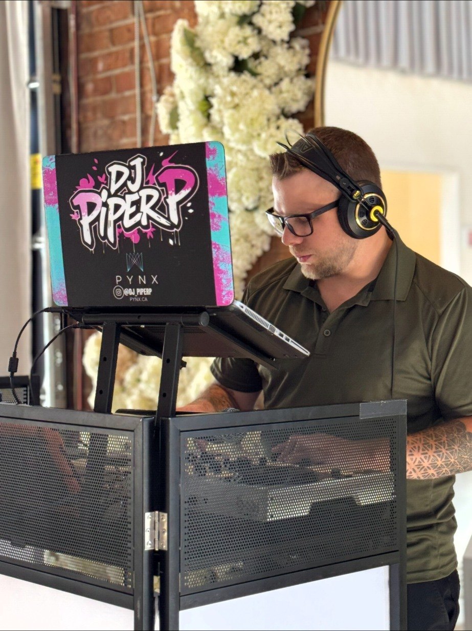DJ Piper P at the booth.